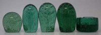 Lot 160 - Four glass bubble dumps and an ashtray.