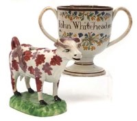Lot 206 - John Whitehead two handled pot and a cow creamer