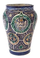Lot 211 - Islamic vase.