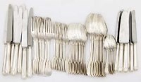 Lot 285 - Part suite of silver flatware including steel bladed knives; fiddle and shell pattern.