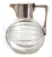Lot 297 - Christopher Dresser type silver decanter.