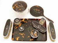 Lot 305 - Tortoishell and silver dressing table set with