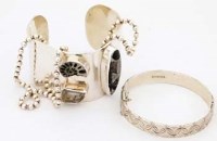 Lot 313 - Silver bangle set with hardstones; another silver