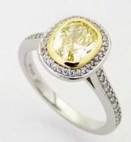Lot 318 - Fancy intense yellow diamond cluster ring