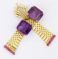 Lot 344 - Unmarked gold and amethyst negligee brooch.