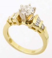 Lot 346 - 18ct gold single stone diamond ring on baguette