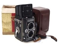 Lot 22 - Rollei magic camera with lense hood, filter, case box and instruction book.