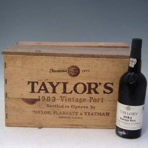 Lot 46 - Taylors 1983 Vintage Port, one case of twelve bottles.