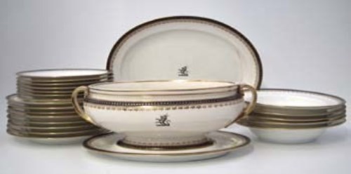 Lot 125 - Quantity Minton crested dinner ware.