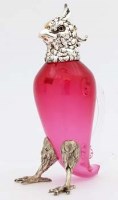 Lot 207 - Ruby glass parrot.