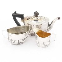 Lot 222 - Half-reeded batchelor's three piece tea set