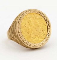 Lot 234 - 1915 gold sovereign in 9ct gold ring mount.