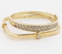 Lot 277 - Two 9ct gold bangles