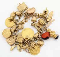 Lot 286 - 9ct gold charm bracelet set with many charms