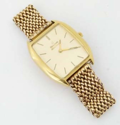 Lot 301 - Bulova 18ct gold wrist watch with 9ct gold