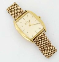 Lot 301 - Bulova 18ct gold wrist watch with 9ct gold strap.