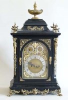 Lot 492 - Black laquered table clock.