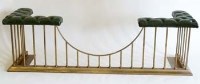 Lot 503 - An Edwardian style brass club fender