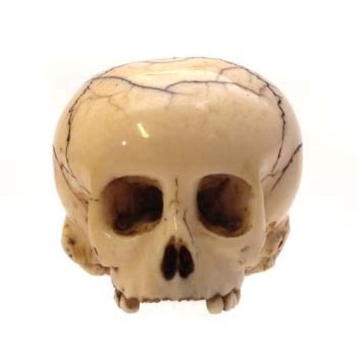 Lot 1 - Ivory skull.