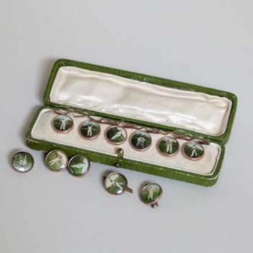 Lot 16 - Cased set of gold plated cricket shirt buttons and five others.