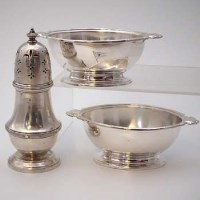 Lot 50 - Electro-plated white starline caster and two sauce tureens (3).