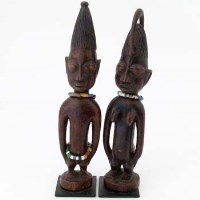 Lot 92 - Ibeji pair of male and female figures