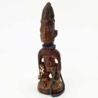 Lot 100 - Yoruba ibeji male figure, some indigo and camwood