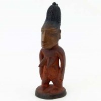 Lot 108 - Yoruba ibeji female figure, indigo and Rickets
