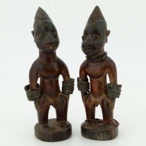Lot 118 - Pair of Yoruba ibeji male figures, with indigo