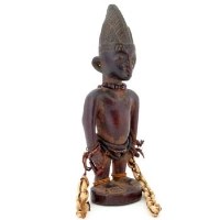 Lot 129 - Yoruba ibeji male figure, indigo head dress