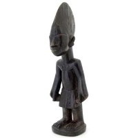Lot 131 - Egba ibeji male figure carved with an apron, all