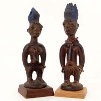 Lot 134 - Pair of Yoruba male and female ibeji figures