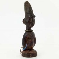 Lot 135 - Yoruba ibeji male figure carved with triangular