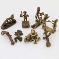 Lot 156 - Eight Ashanti bronze miniature figures and