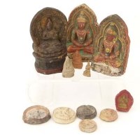 Lot 172 - Three Tibetan dried and painted mud seated
