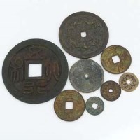 Lot 186 - Eight Chinese cast bronze circular coins, 15cm 
