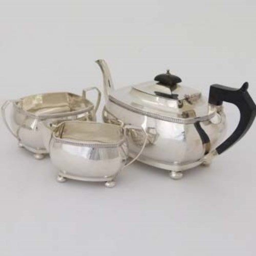 Lot 510 - Three piece silver tea set.