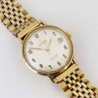 Lot 625 - Omega 9ct gold seamaster mans wristwatch on G.P. bracelet, boxed with original receipt.