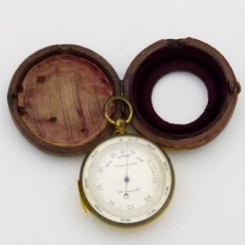 Lot 8 - Cased pocket compass / barometer.