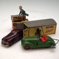 Lot 76 - Schuco garage, a car and an express boy toy.