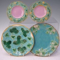 Lot 126 - Two George Jones plates / butter pats.
