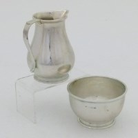 Lot 193 - Silver cream jug and sugar basin.