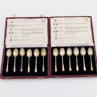 Lot 197 - Two cased sets of silver tea spoons.