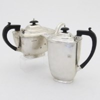 Lot 204 - Silver tea pot and coffee pot.