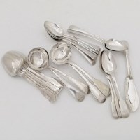 Lot 215 - Mixed silver dessert spoons, two pairs of ladles, two fish knives 32oz in total.
