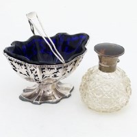 Lot 227 - Silver sugar bowl and a silver and tortoiseshell bottle.
