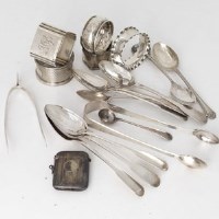 Lot 230 - Collection of mixed silver spoons, sugar nips, napkin rings etc.
