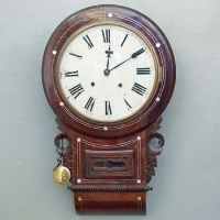 Lot 7 - Inlaid rosewood wall clock.