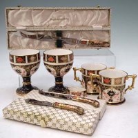 Lot 213 - Pair of Crown Derby goblets, a pair of loving cups, three cased knives and a napkin ring.