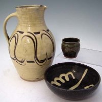 Lot 216 - Three pieces of Winchcombe pottery possibly by Michael